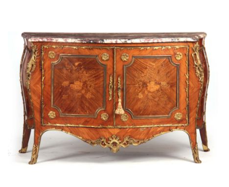 A FINE EARLY 19TH CENTURY FRENCH ORMOLU MOUNTED, MARQUETRY INLAID AND KINGWOOD SERPENTINE COMMODE OF BOMBE OUTLINE with mould
