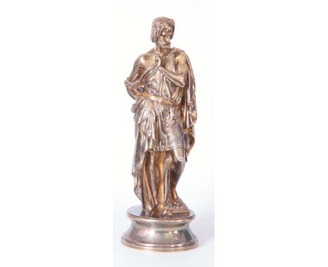 A 19TH CENTURY SILVERED AND GILT BRONZE SCULPTURE FIGURE OF A CLASSICAL GREEK PHILOSOPHER holding a mallet and chisel 48cm hi