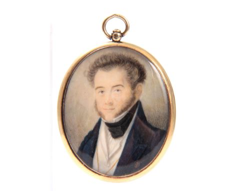 A 19TH CENTURY MINIATURE PORTRAIT OF A GENTLEMAN ON IVORY - mounted in a gold surround 7cm high 5cm wide. 