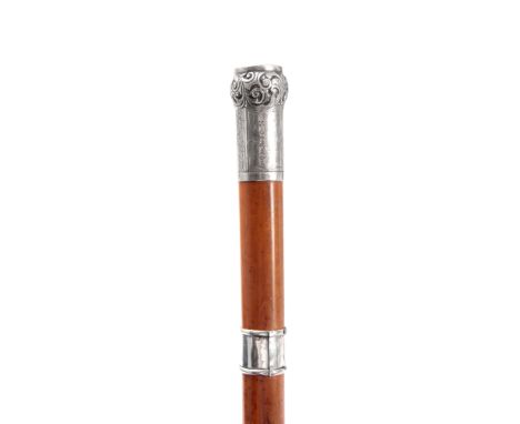 A LATE 19TH CENTURY GENTLEMANS SILVER AND MOTHER OF PEARL MOUNTED MALACA SWORDSTICK with rococo style embossed handle having 