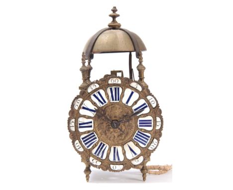 AN 18th CENTURY FRENCH LANTERN CLOCK having a 7.5" brass embossed dial with porcelain Roman and Arabic numerals fronting a we