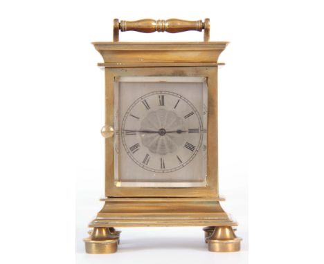 P. CATTANEO, RYEGATE. A MID 19th CENTURY ENGLISH CARRIAGE CLOCK having a heavy moulded brass case with turned handle enclosin