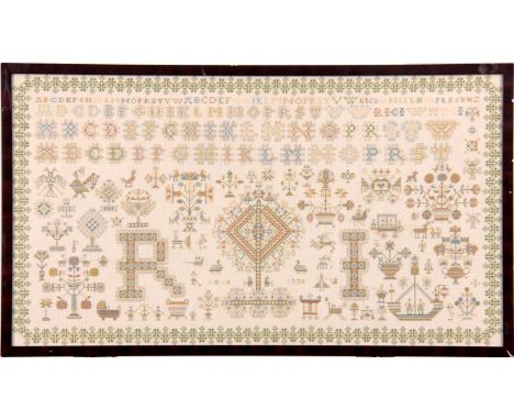 AN 18TH CENTURY STYLE LARGE NEEDLEWORK SAMPLER with geometric border enclosing alphabets, flowering urns, trees, birds and fi
