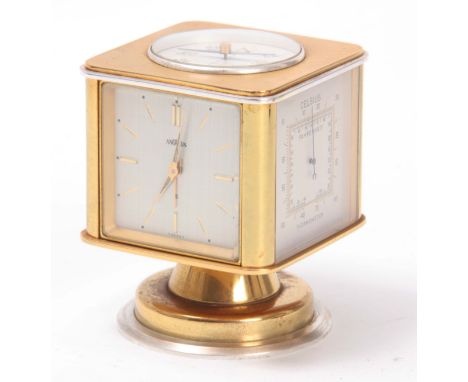 ANGELUS  A 1950's SWISS GILT BRASS PORTABLE DESK CLOCK/WEATHER STATION the revolving cube body with inset compass to the top 