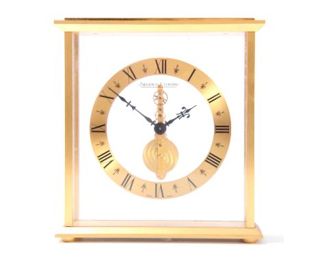 A MID 20TH CENTURY JAEGER-LECOULTRE MANTEL CLOCK  the gilt brass glazed case enclosing a Swiis spring-driven eight-day inline