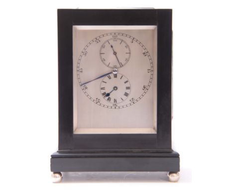 A SMALL EBONY VENEERED TABLE REGULATOR the case of rectangular form with ebony veneer and solid ebony moulding supported on s