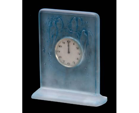 R LALIQUE AN UNUSUAL 'SIX HIRRONDELLES PERCHEES' CLOCK  of footed rectangular form highlighted in blue staining 15cms high  1