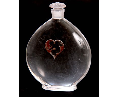 R LALIQUE  A CLEAR 'L'AMOUR DANS LE COEUR' PERFUME BOTTLE AND STOPPER  of footed flattened form with cupid and love heart mot
