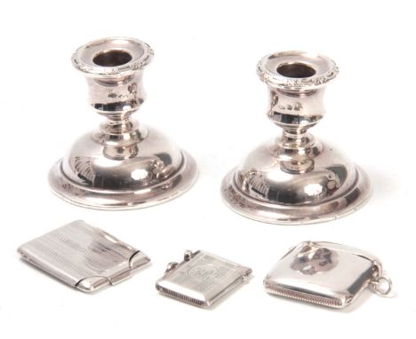 AN EDWARD VII LARGE PLAIN BOWED SILVER VESTA CASE Birmingham 1906 A SMALLER RECTANGULAR SILVER VESTA CASE with part engine tu