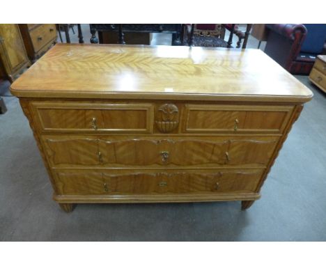 A French satin birch commode