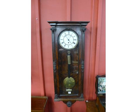 A 19th Century walnut Vienna single weight wall clock