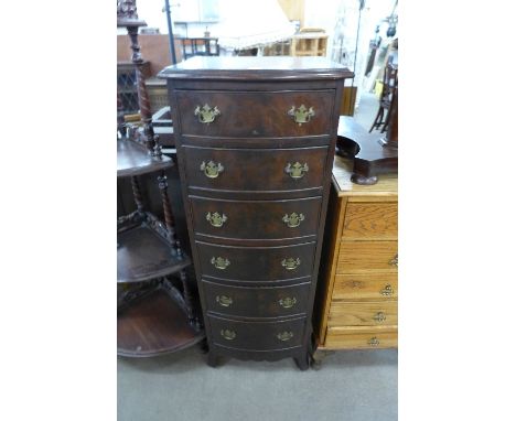 A mahogany bow front six drawer chest