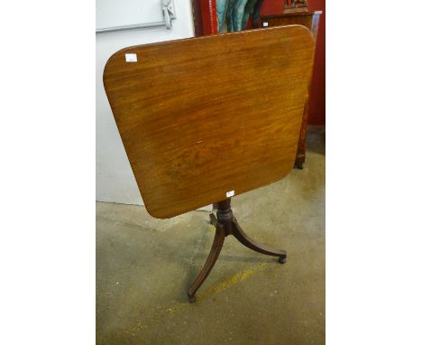 A Victorian mahogany square tilt top tripod table