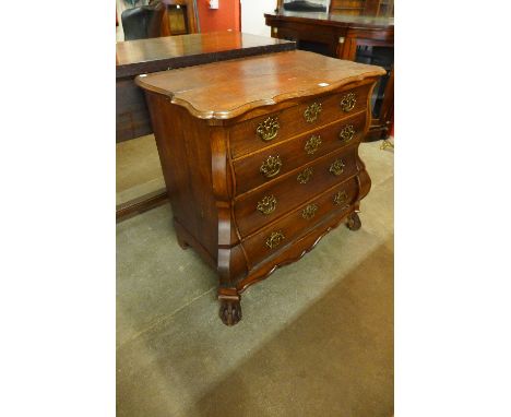 A 19th Century Dutch oak bombe commode