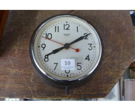 A Smiths Sectric Bakelite circular wall clock