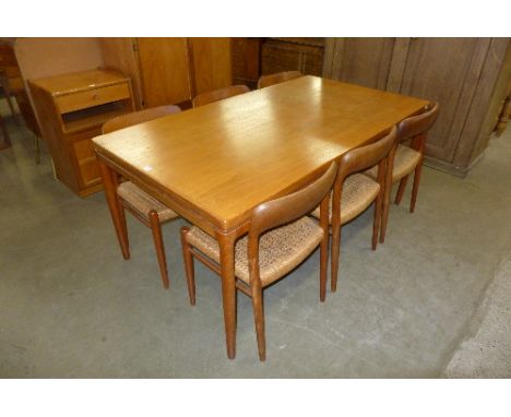 A Danish Niels Moller teak extending dining table for J.L. Mollers and six 75 model chairs