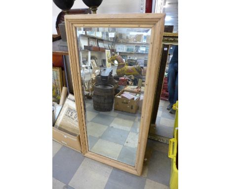 An oak framed mirror