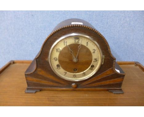 An Art Deco oak mantel clock