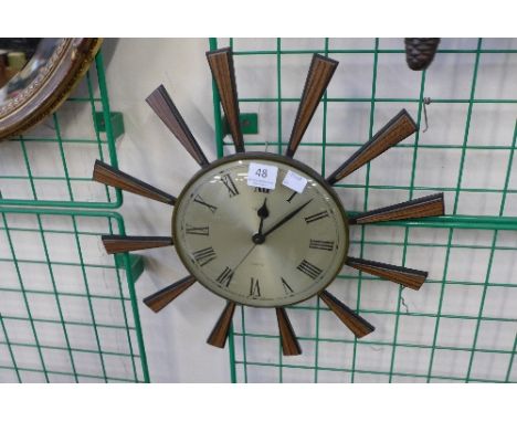 A Metamec Starburst wall clock