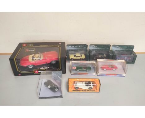 Eight boxed model Jaguars comprising of a Bburago 1:18 scale Jaguar E Coupe 1961 Cod 3018, three Corgi Jaguar Vanguards to in