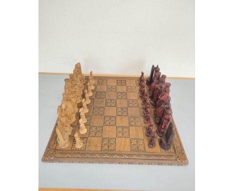 Contemporary composite chess set modeled after medieval figures.&nbsp; 