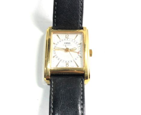 Vintage Oris 7460 pointer automatic gents wristwatch rectangular case silvered engine turned dial with gilt arabic numerals l
