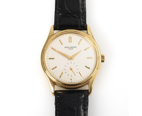             Goldene Armbanduhr "Calatrava". Patek Philippe. 1995-1998. Referenz-Nr. 5023J-001, Werk-Nr. 1861630 2992362, Kali