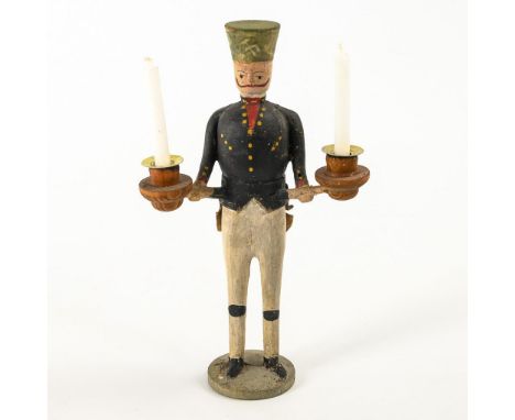 Alter Bergmannsleuchter mit Brotteigarmen, Erzgebirge. Wohl frühes 20. Jahrhundert.Holz, farbig gefasst. H 26,5 cm. Figur ein