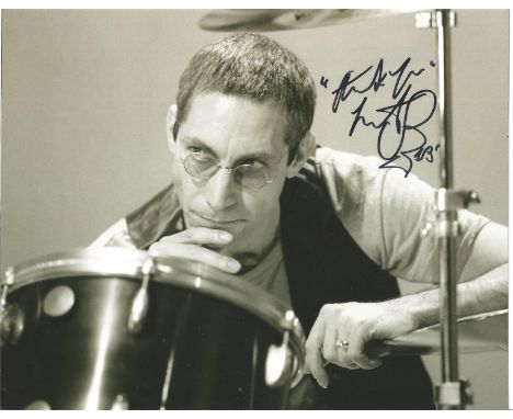 Charlie Watts, English drummer best known for his part in The Rolling Stones, signed 19x8 black and white photograph. Good co