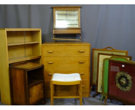 FOUR VINTAGE FIRE SCREENS, two lightwood book cases, a wall hung toilet mirror with locker, a light wood chest of four drawer