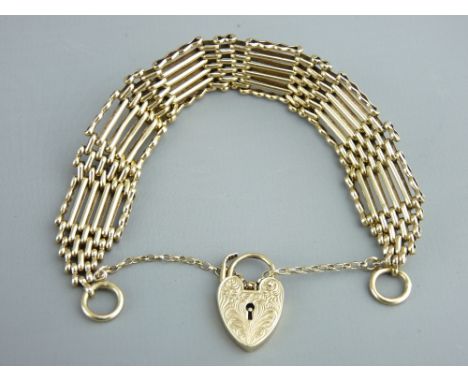 A 9CT GOLD GATE LINK BRACELET with chase decorated padlock clasp, 24gms gross