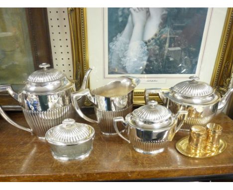 A FIVE PIECE EPNS RIB PATTERNED TEA SERVICE and a three piece modern brass cruet set