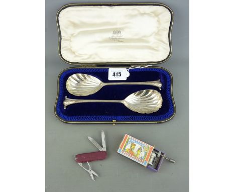 A CASED PAIR OF SILVER SERVING SPOONS - London 1907, 3.9 troy ounces, a windup musical match box and a vintage pocket knife