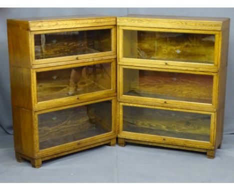 GLOBE WERNICKE - A GOOD MATCHING PAIR OF TRIPLE SECTION MID OAK BOOK CASES each section with having a plain glass panel lifti