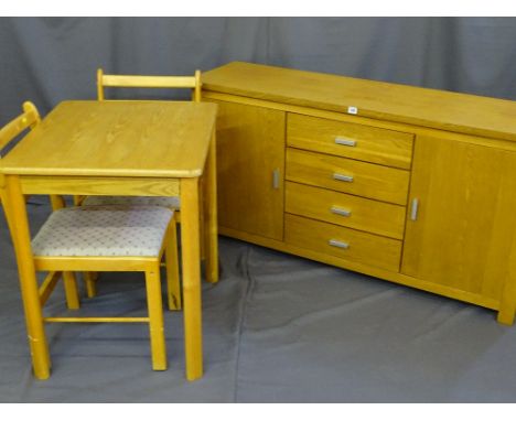 A MODERN LIGHT WOOD SQUARE TOPPED TABLE and two matching upholstered chairs along with a similar four drawer sideboard with f