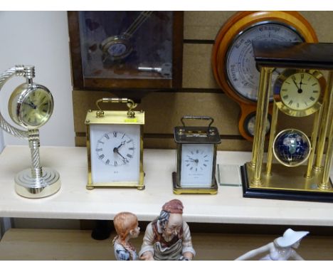 A MATTHEW NORMAN LONDON BRASS CARRIAGE CLOCK and three further modern mantle clocks