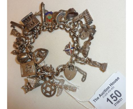 Vintage Sterling silver charm bracelet with plenty of charms, some opening and including an enamel Festival of Britain charm,