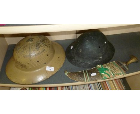 Army tin helmet, cardboard pith helmet (c. WW2), a large tourist Jambiya dagger in decorative scabbard