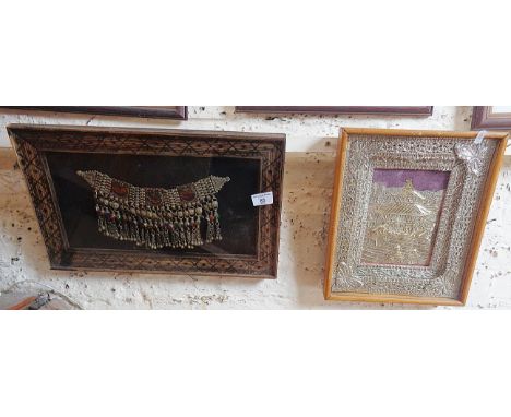 Old framed Indo Persian white metal and enamel necklace together with an Asian silvered and embossed tin picture