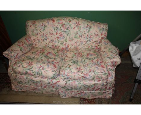 Two seater Sofa by Peter Dudgeon of London with two loose covers, first cover has two seat cushions and a pair of arm caps, t