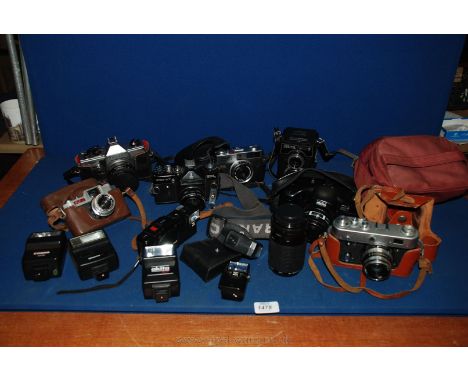 A quantity of Cameras including a Russian Fed 3 35mm range finder camera with a 52mm f/2.8 lens, an Olympus XA2 Compact 35mm 