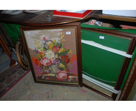 A framed Tapestry depicting a basket of flowers and another glazed Frame to match.