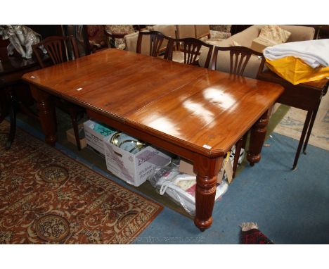 A Victorian light Walnut wind-out extending Dining Table with extra wide leaf, moulded edge rectangular top with cut corners,