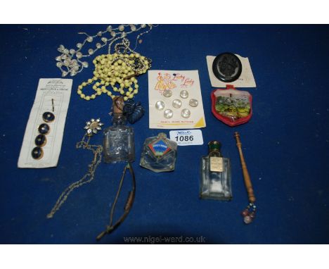 A turned wood lace Bobbin, Victorian enamel plaque of Ludlow, buttons, scent bottles, etc.
