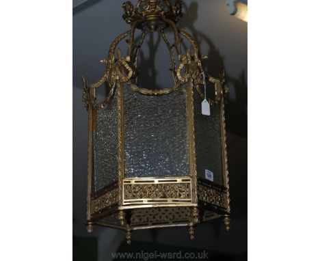 A large hexagonal Brass and glass Lantern 22" tall, 13 1/2" diameter.