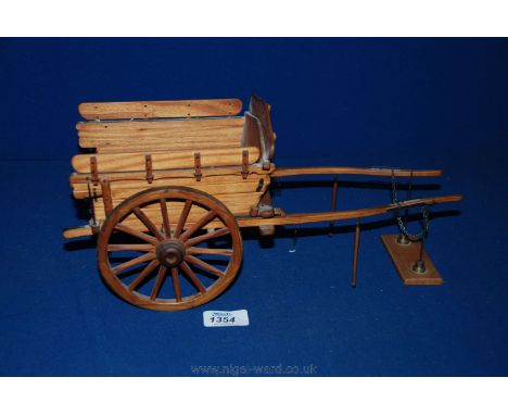 A fully functioning scale Model of a two wheeled farm Cart with tipping action, completely hand crafted from scratch from sca