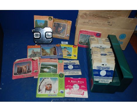 A vintage Bakelite View-master viewer, a View-master Projector and large quantity of View-master Reels.