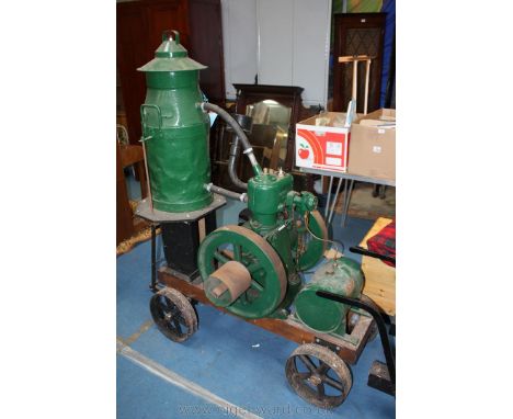 A LISTER Spec. A69 green painted, Tank (Churn) Cooled, twin-flywheel stationary petrol engine with bread-loaf type magneto. S