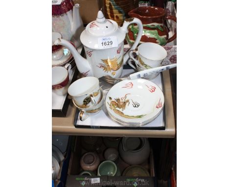 A small part set oriental style Coffee pot and lid, four cups and saucers, red and gold dragon decoration, plus a willow patt