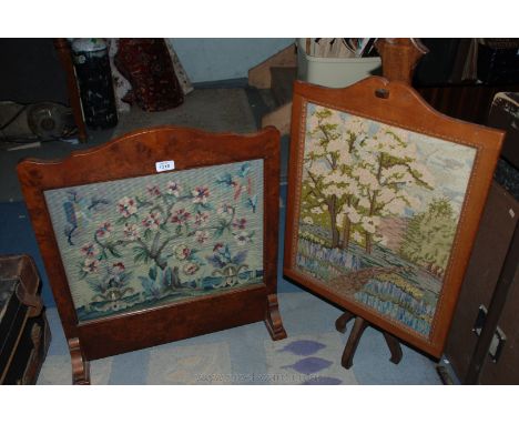 Two Firescreens, one being Walnut framed with tapestry under glass, the other Mahogany with tapestry.